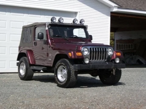 2003 Red Jeep TJ.webp