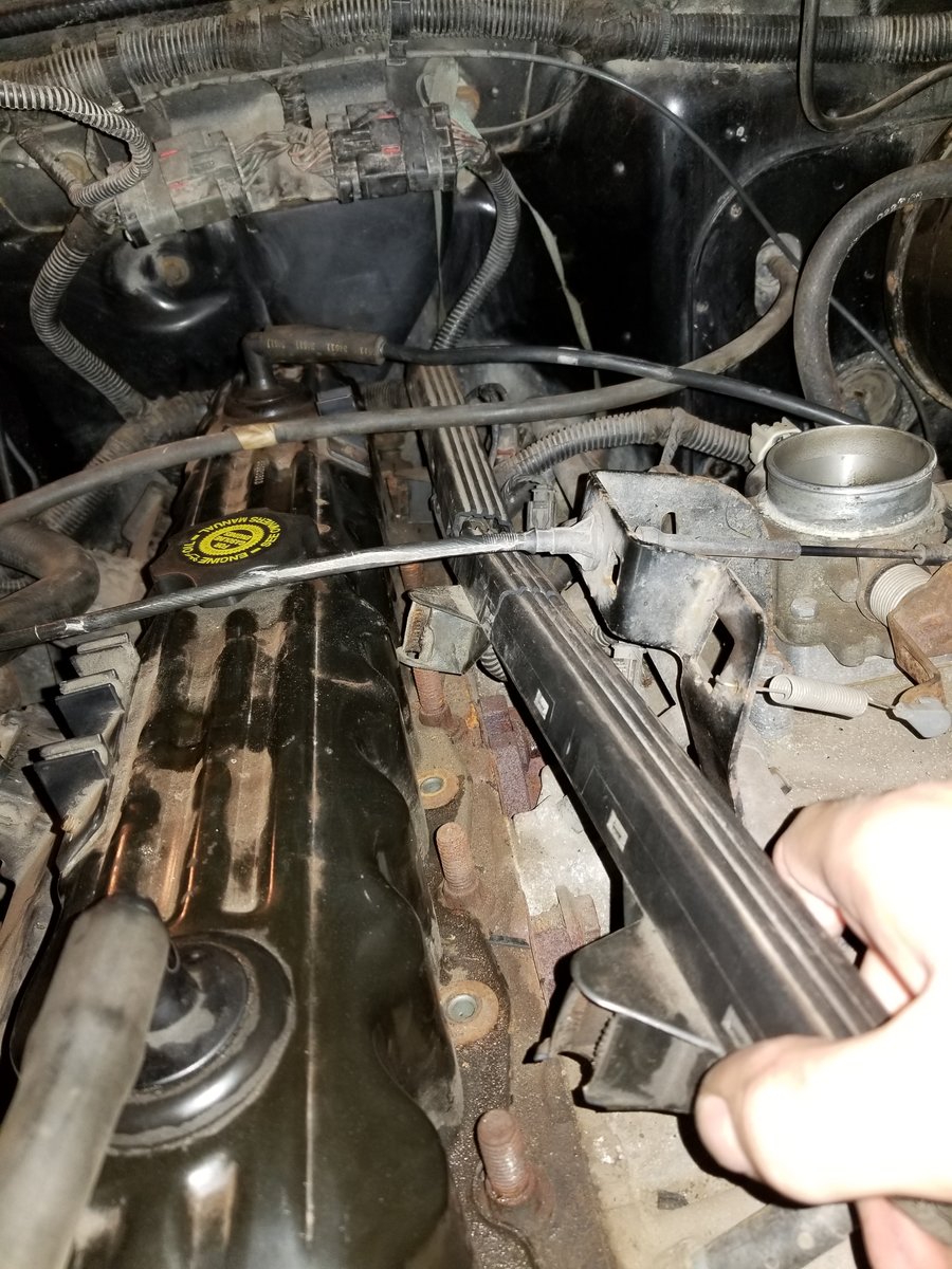 Anyone know the name of this plastic piece that holds spark plug wires in  place? | Jeep Wrangler TJ Forum