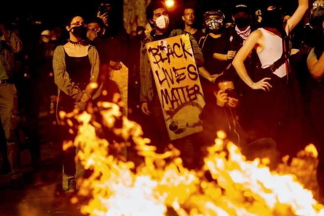 41bcadc4-Racial_Injustice_Portland_--_AP_--_8_1_20.webp