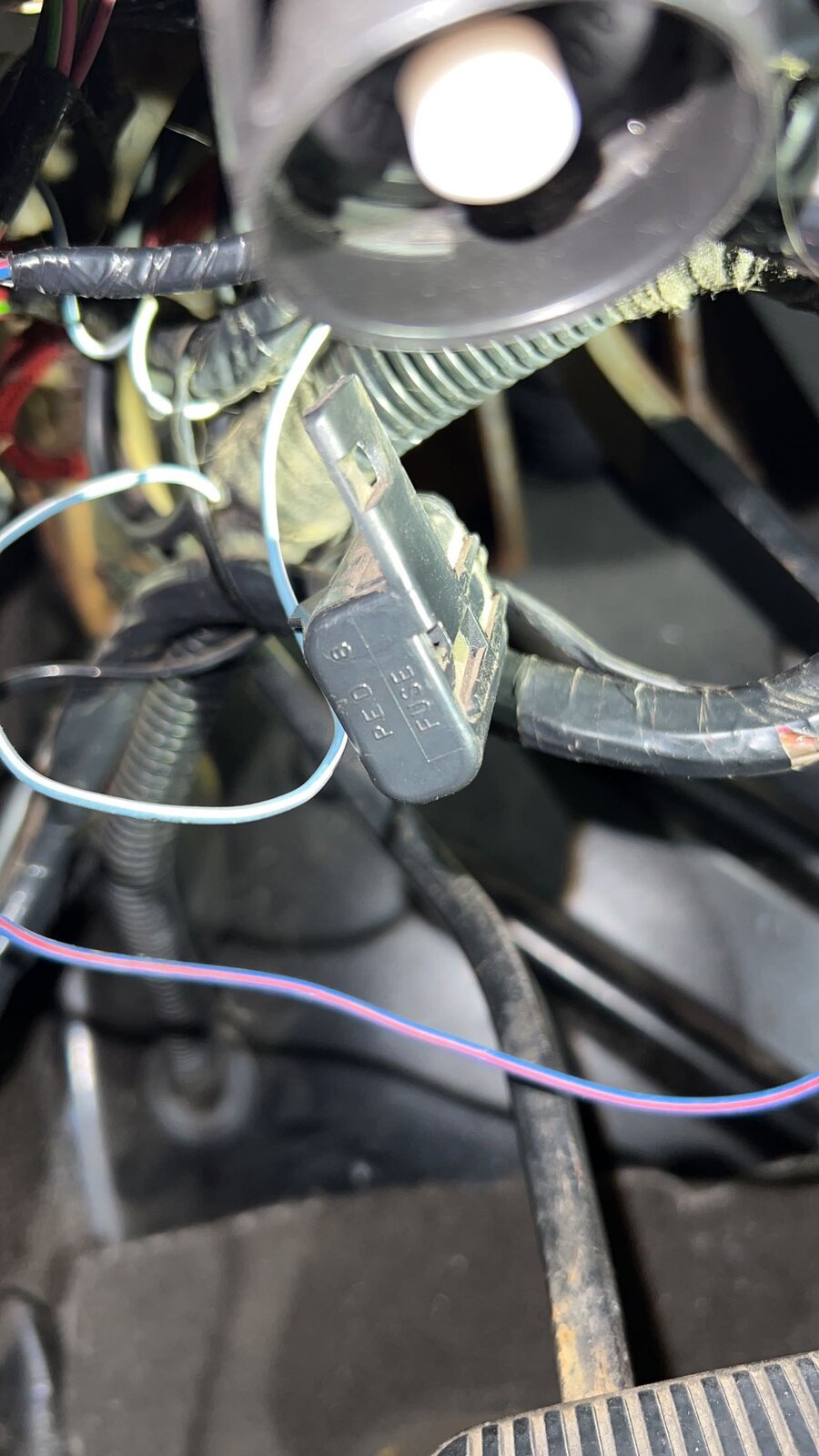 Fuse Holder, Located above Clutch Pedal