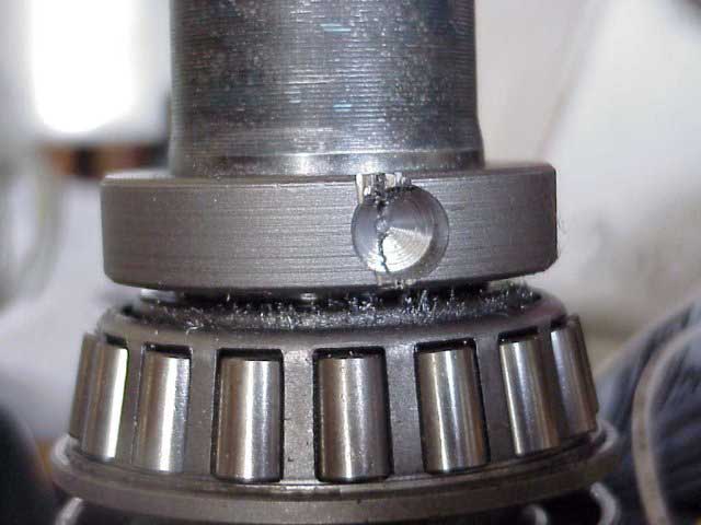 Axle shaft bearing retainer drilled.jpg