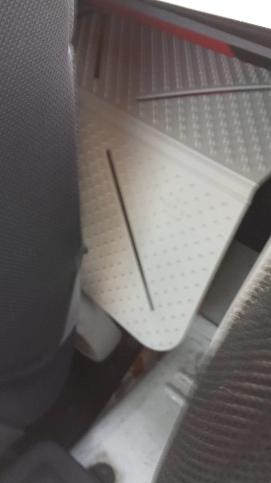 behind front seat.webp