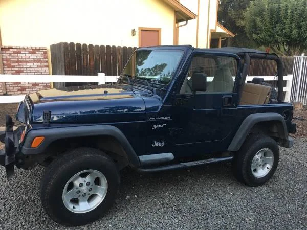 Blue Jeep TJ.webp