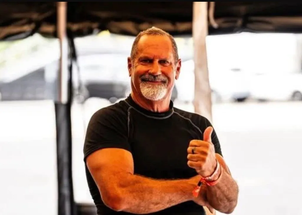 Charles Romer giving a thumbs up.