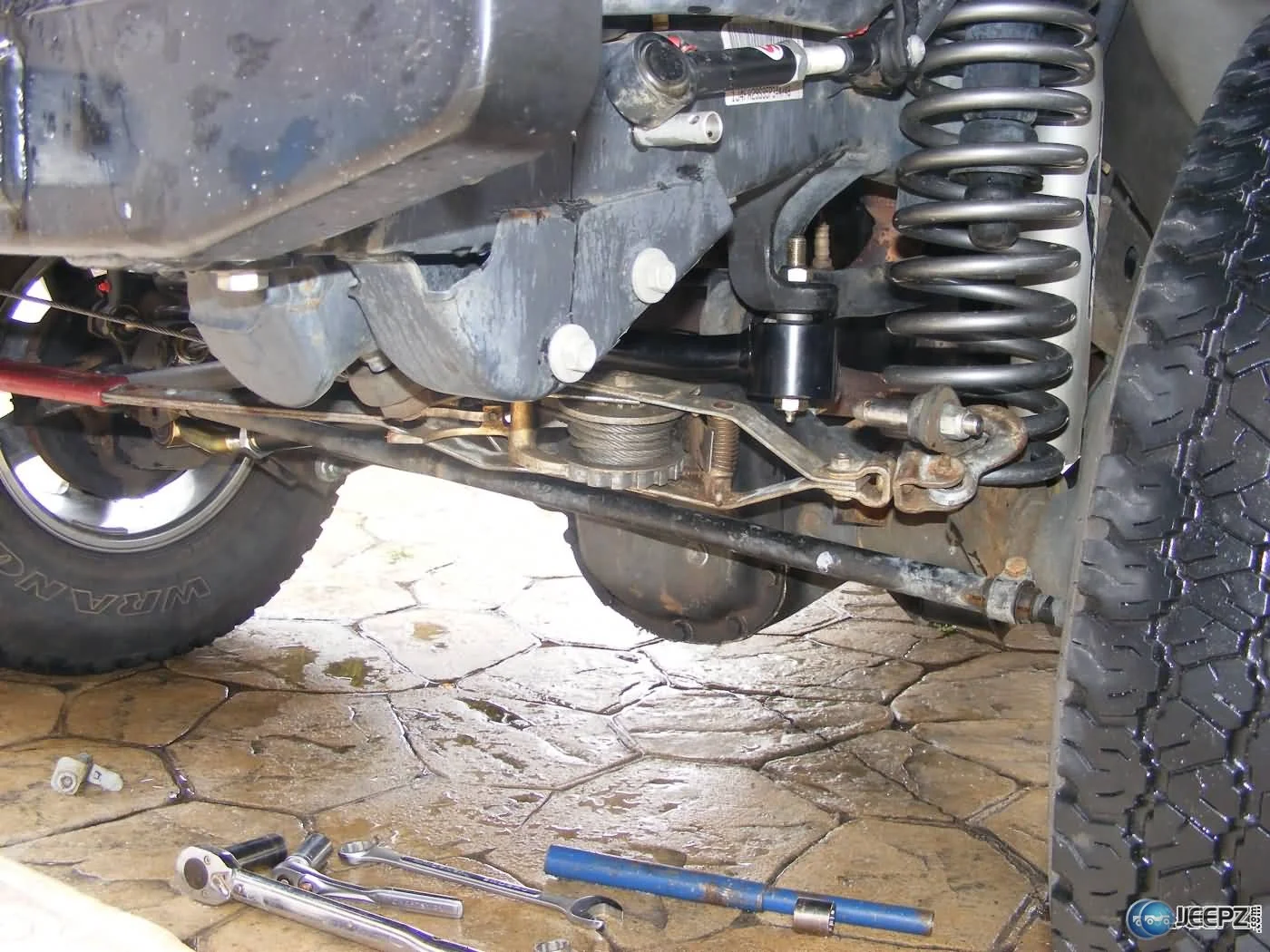 drivers_side_attach_jeep_trackbar_install.webp