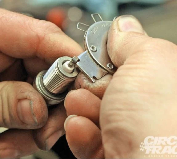 Gapping a platinum or iridium spark plug.webp