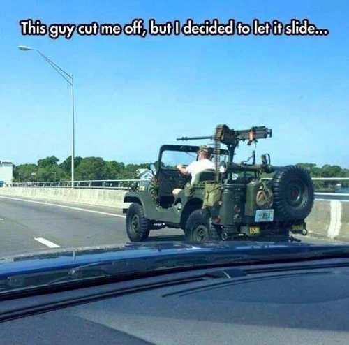guy-cut-off-traffic-minigun.webp