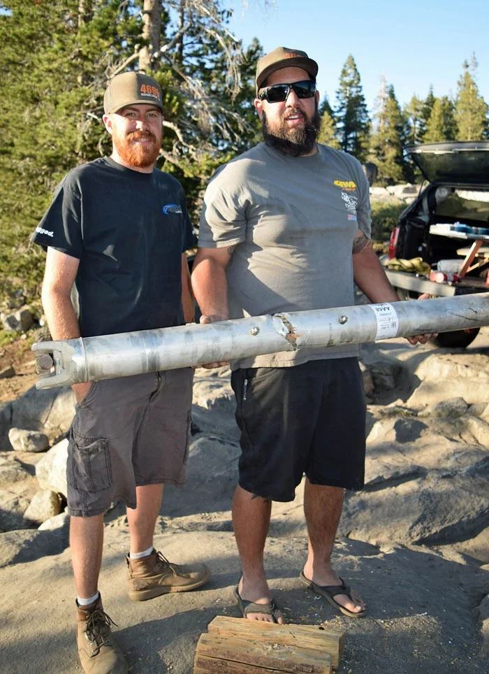 Holding repaired driveshaft.jpg