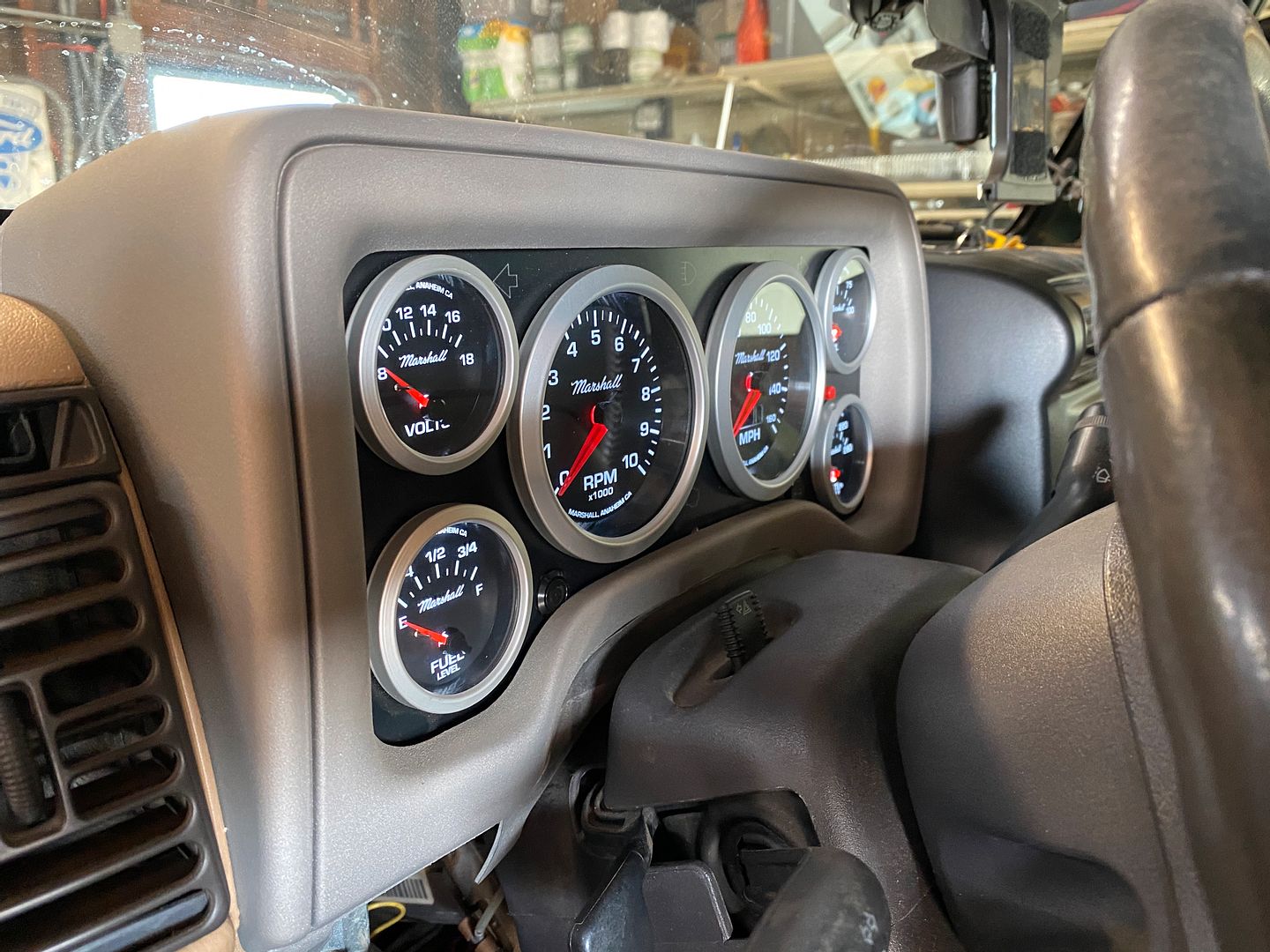 Has anyone swapped out their factory gauge cluster with aftermarket