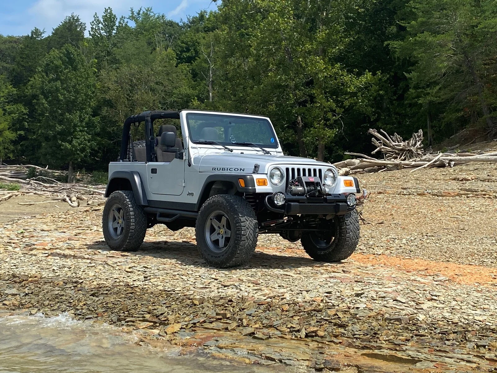 jeep on beach.webp