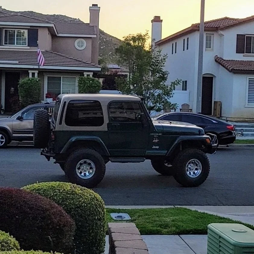 Jeep on street wide.webp