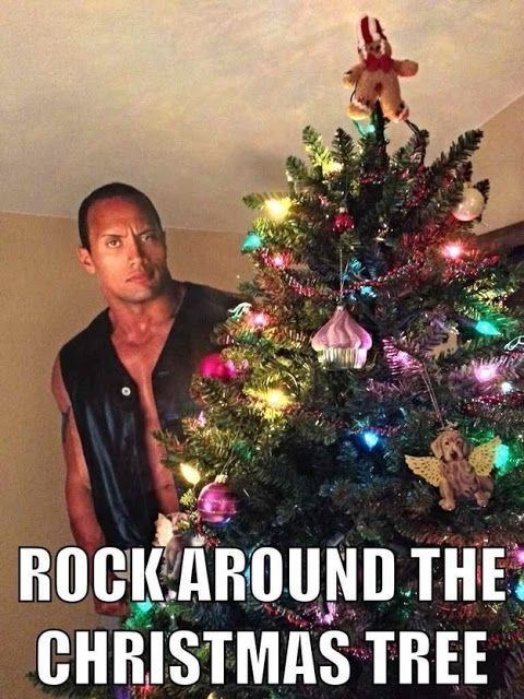 man-rock-%C3%A1round-christmas-tree.jpg