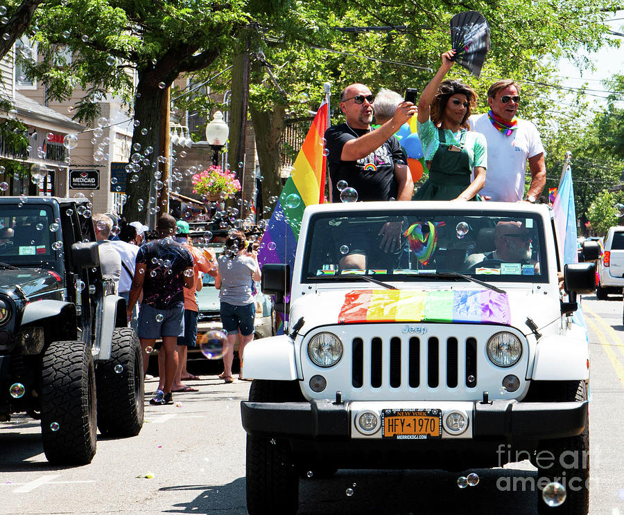 people-standing-in-jeep-during-gay-pride-car-parade-david-wood.jpg