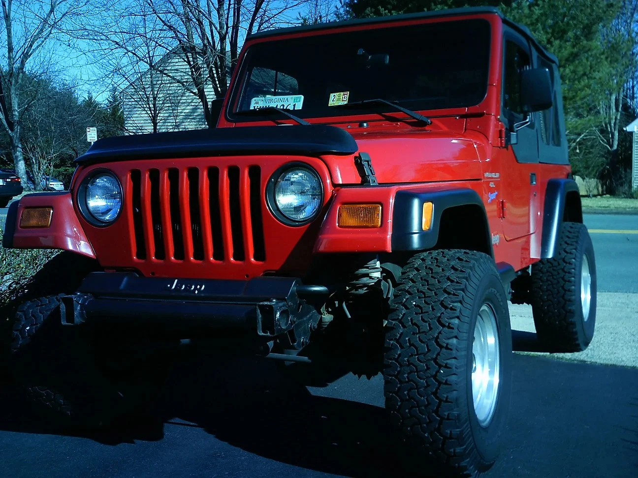 red jeep front.webp