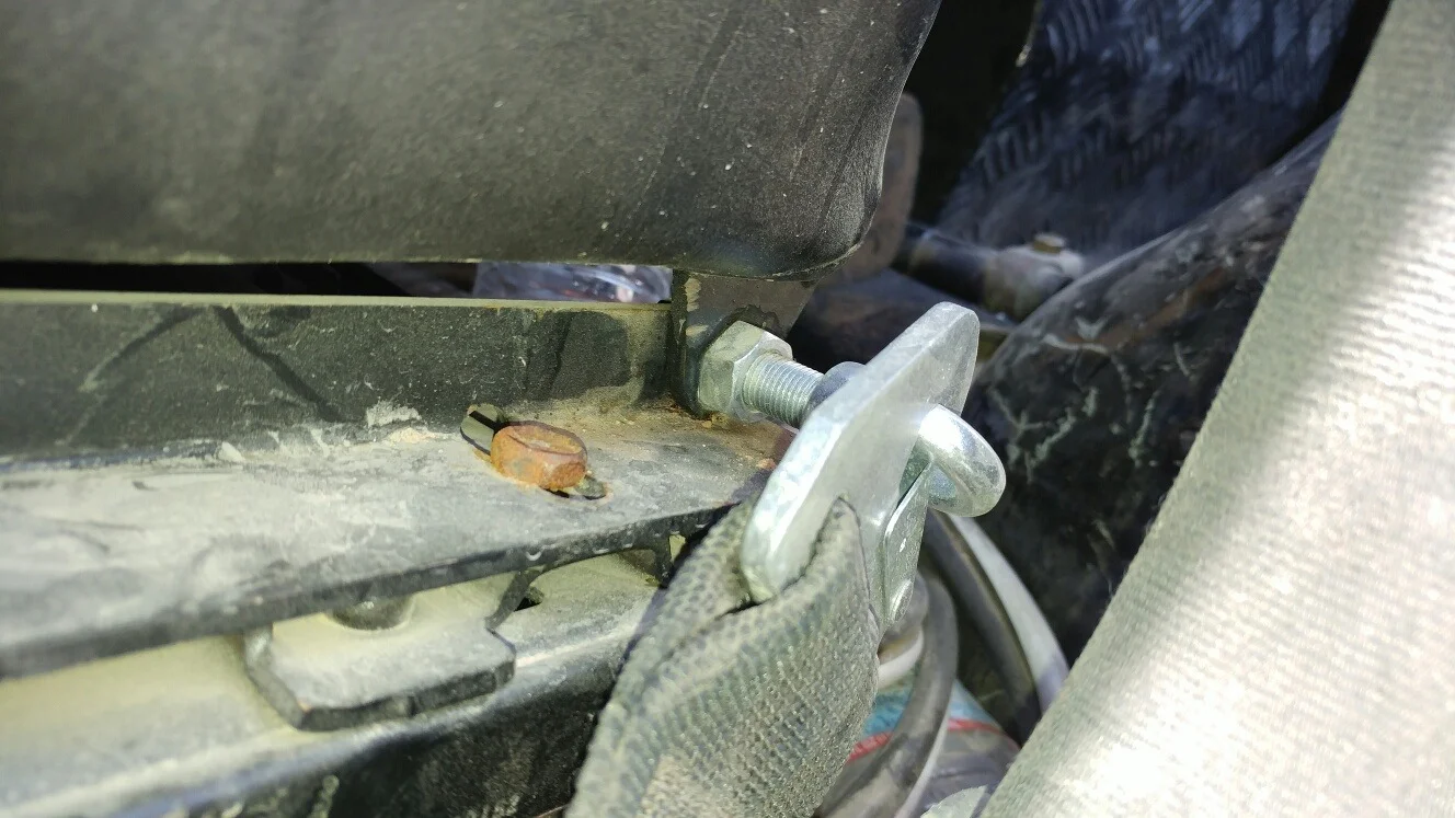 Seat belt mount, outside.webp