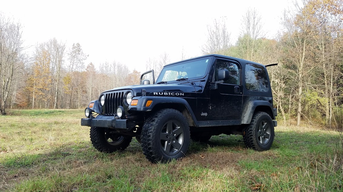 Black headlight bezel on a black TJ? | Jeep Wrangler TJ Forum