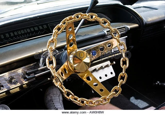 steering-wheel-made-of-gold-plated-chain-aw0h8w_zpswbpjeauv.webp