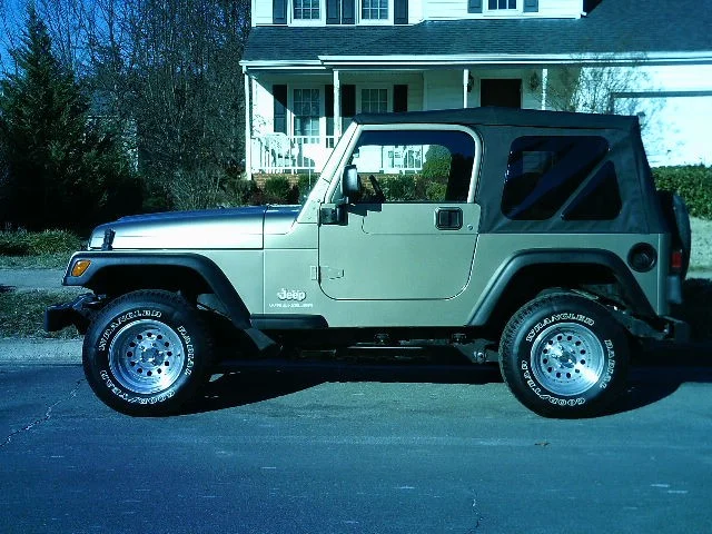 tan jeep lifted bl (2017_11_20 00_38_12 UTC).jpg