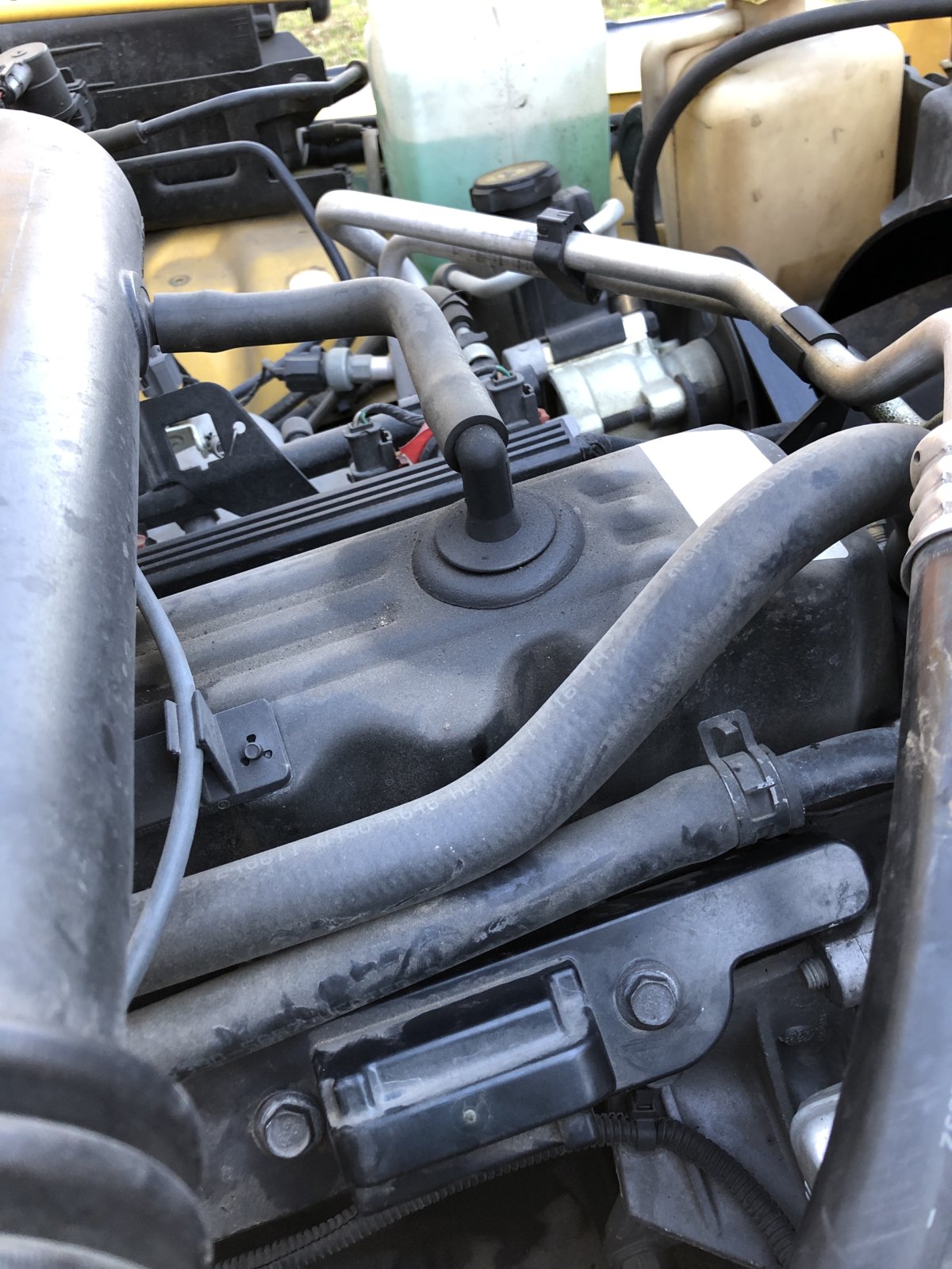 Oil around grommets on valve cover | Jeep Wrangler TJ Forum