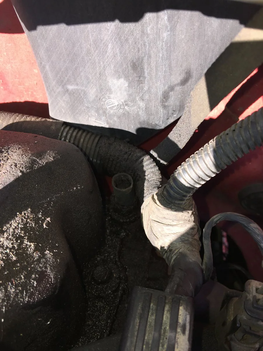 Valve cover harness head stud rub thru.webp