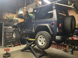 Bethany's Jeep on Lift.jpg