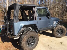 Jeep side with new flares.JPG