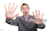 surprised-businessman-both-hands-up-whoa-white-background-picture-id174621599.jpg