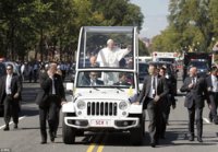 0578-3246462-Saying_hello_The_pope_moved_slowly_past_throngs_lining_his_route-a-26_1443027213345.jpg